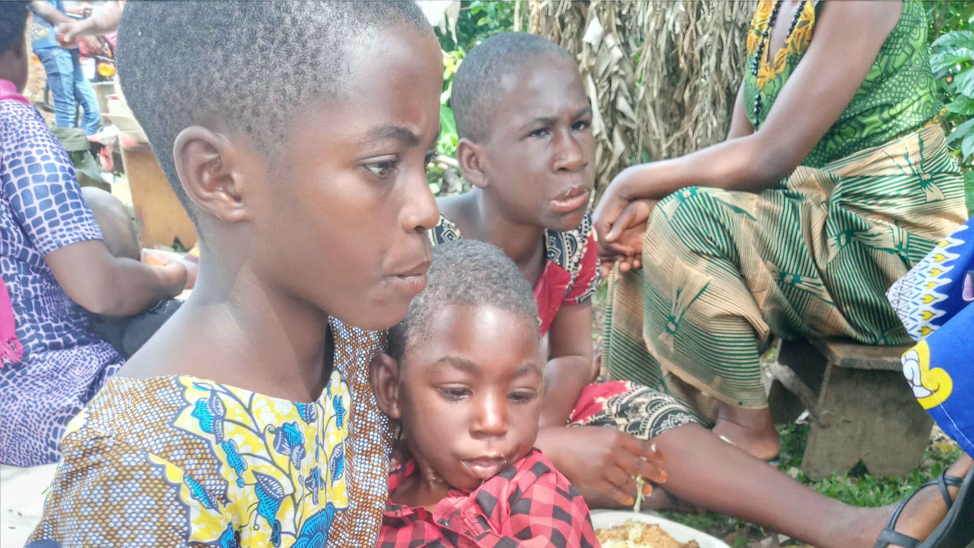 Disadvantaged children having food at the program